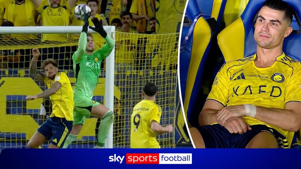 Cristiano Ronaldo looking dejected on the pitch in an Al Nassr kit