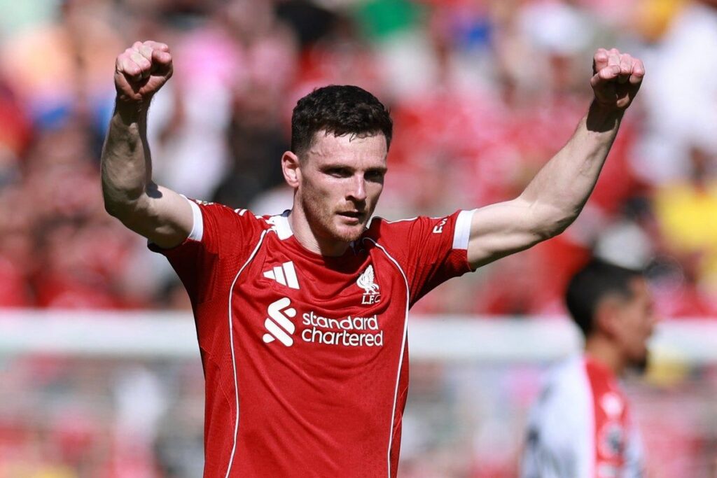 Andy Robertson applauding the Liverpool supporters inside Anfield