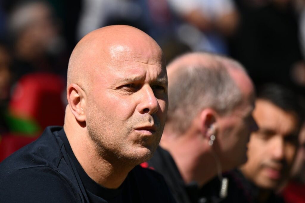 Liverpool manager Arne Slot looking serious on the touchline during a Premier League match