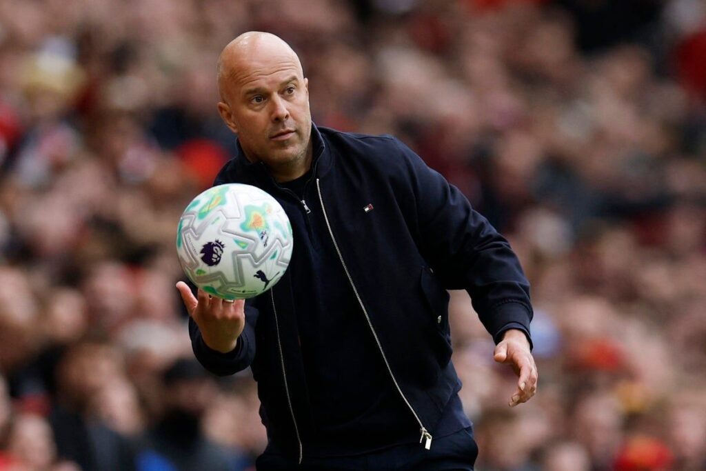 Liverpool manager Arne Slot looking serious on the touchline