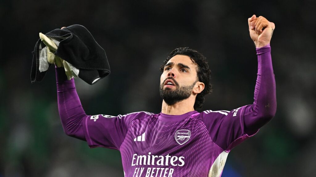 Arsenal goalkeeper David Raya pointing and shouting instructions during a Premier League match