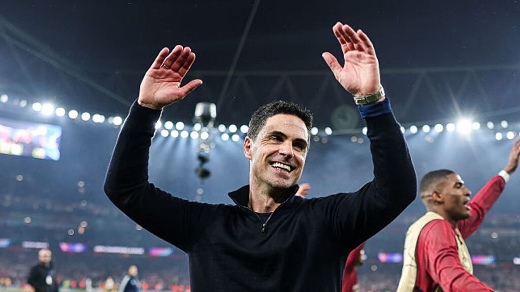 Mikel Arteta celebrating on the touchline during an Arsenal match