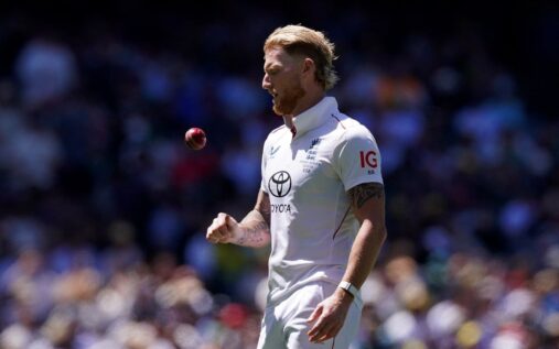 Ben Stokes wearing his Durham county cricket kit preparing to bowl a delivery on the pitch