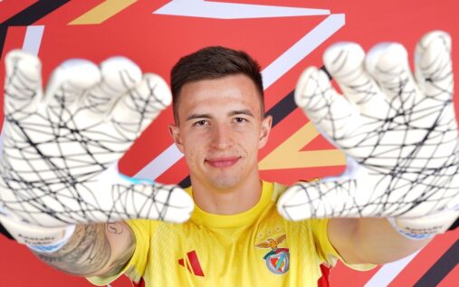 Anatoliy Trubin celebrating in his Benfica goalkeeper kit during a Champions League match