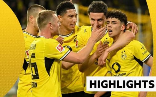 Borussia Dortmund players celebrate on the pitch at Signal Iduna Park after defeating Eintracht Frankfurt 3-2.