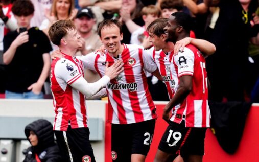 Mikkel Damsgaard and Brentford teammates celebrating a goal against West Ham in the Premier League