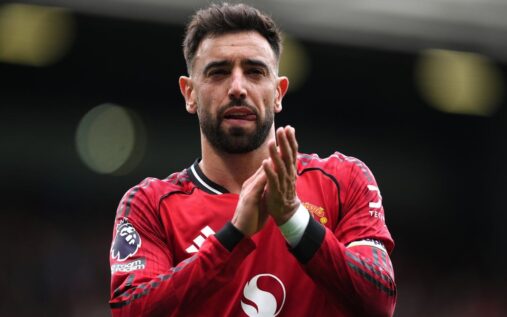 Bruno Fernandes applauding the fans during a Manchester United Premier League match