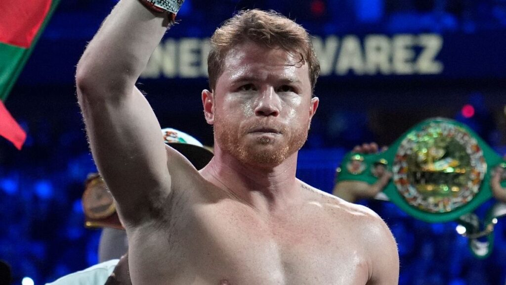 Canelo Alvarez posing in the boxing ring ahead of a world championship fight