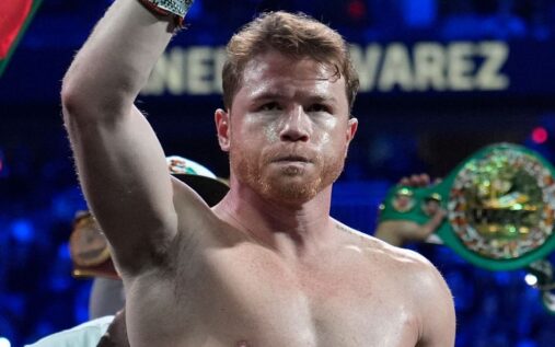 Canelo Alvarez posing in the boxing ring ahead of a world championship fight