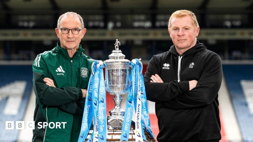 Martin O'Neill and Neil Lennon standing on the touchline during a Scottish football match
