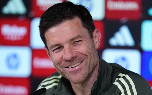 Xabi Alonso giving tactical instructions on the touchline