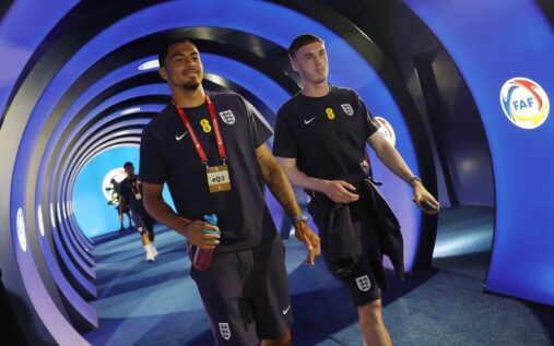 Chelsea teammates Cole Palmer and Levi Colwill looking dejected on the football pitch