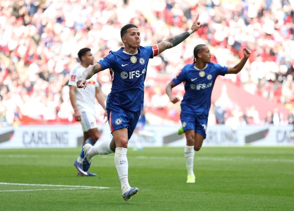 Chelsea football players wearing their traditional blue home kits