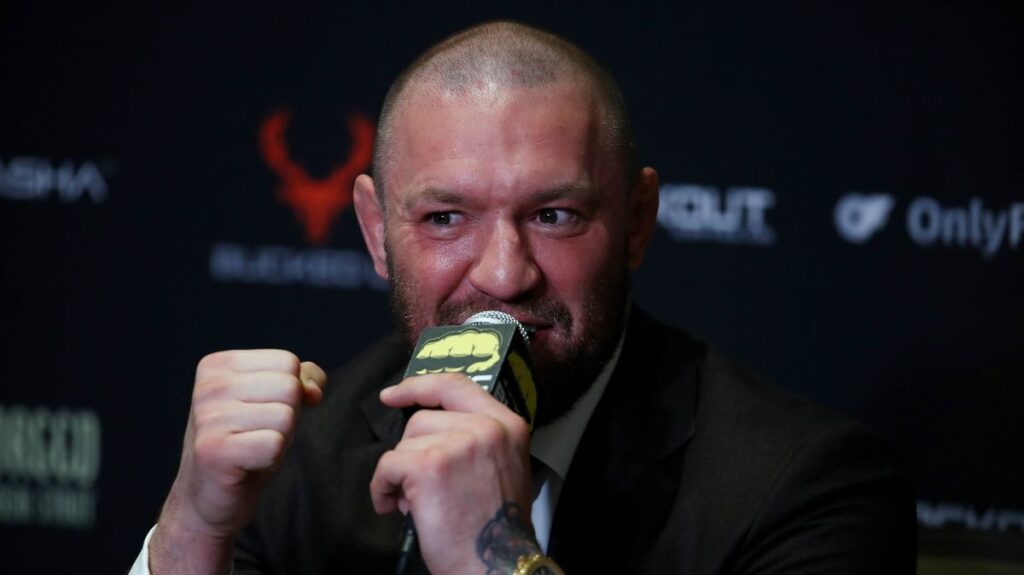 Conor McGregor inside the UFC octagon preparing for a mixed martial arts fight
