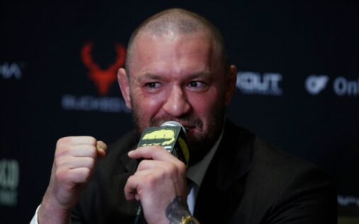 Conor McGregor inside the UFC octagon preparing for a mixed martial arts fight