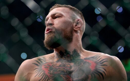 Conor McGregor and Max Holloway facing off inside the UFC Octagon