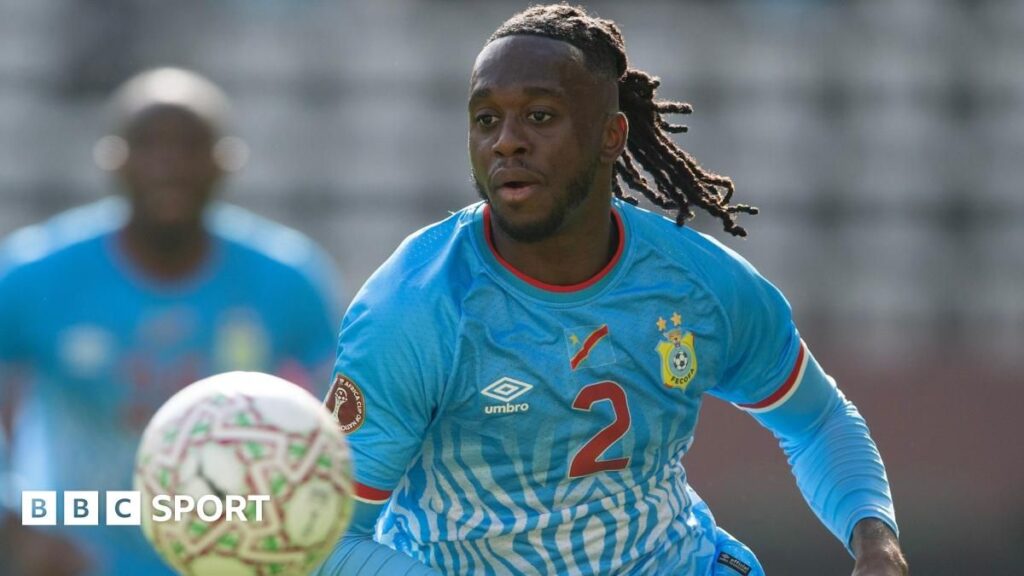 Aaron Wan-Bissaka and Yoane Wissa wearing the DR Congo national team jersey