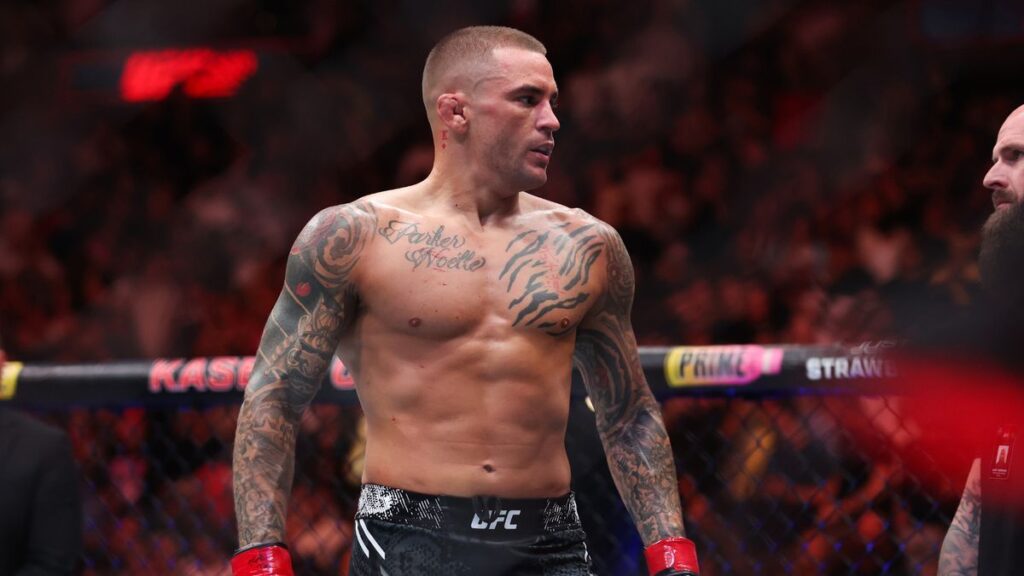 Dustin Poirier looking focused inside the UFC octagon during a mixed martial arts bout