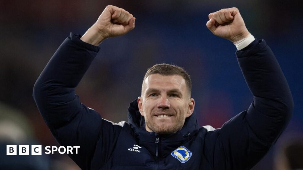 Edin Dzeko playing for Bosnia-Herzegovina during a World Cup qualifying match.