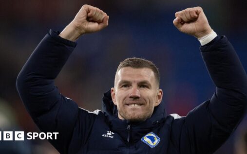 Edin Dzeko playing for Bosnia-Herzegovina during a World Cup qualifying match.
