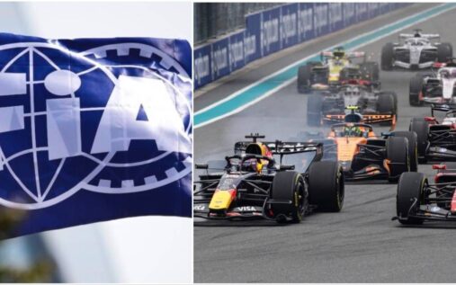 Max Verstappen wearing his Red Bull racing suit looking frustrated in the Formula 1 paddock