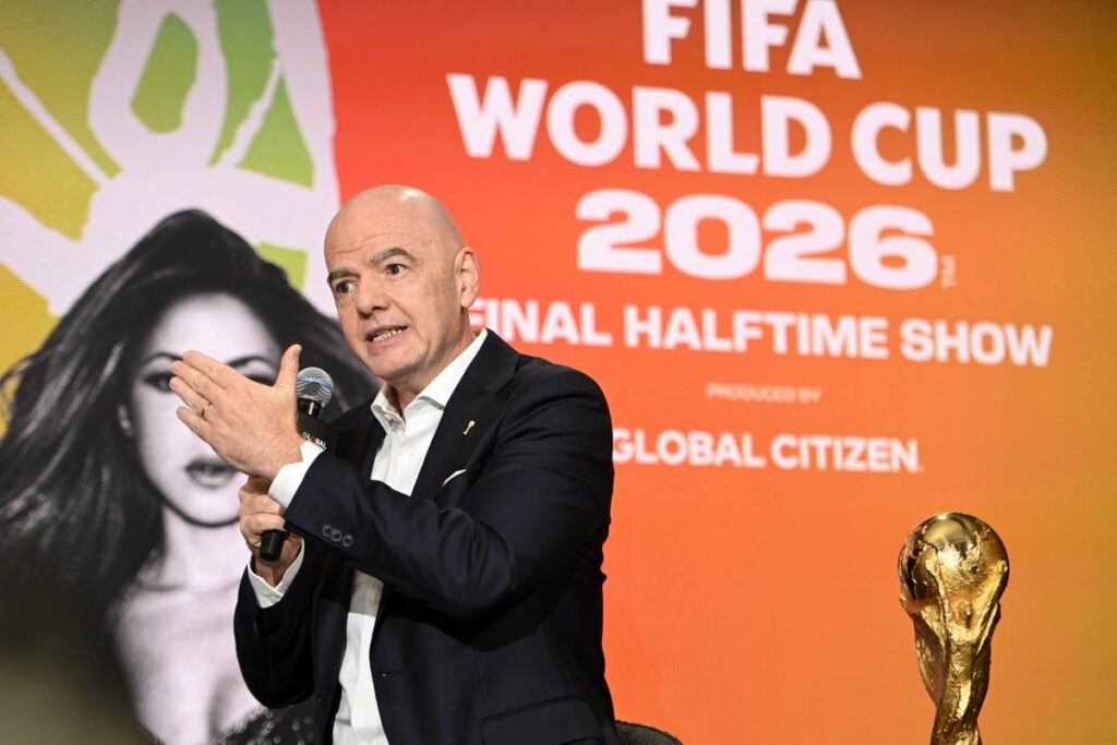The Fifa World Cup trophy displayed alongside a television broadcast camera