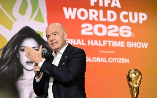 The Fifa World Cup trophy displayed alongside a television broadcast camera