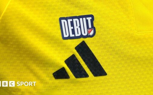 A national team football shirt featuring a newly introduced World Cup debut patch on the upper-right chest