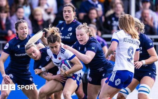 France rugby players celebrating a try against Scotland during their Women's Six Nations match
