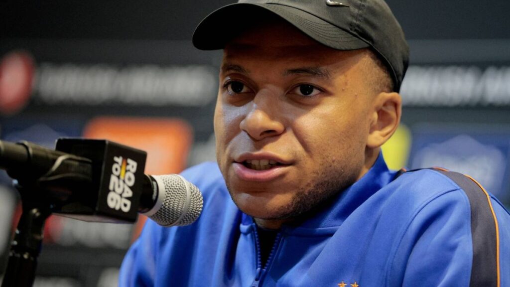 Kylian Mbappe wearing the France national team captain's armband looking serious