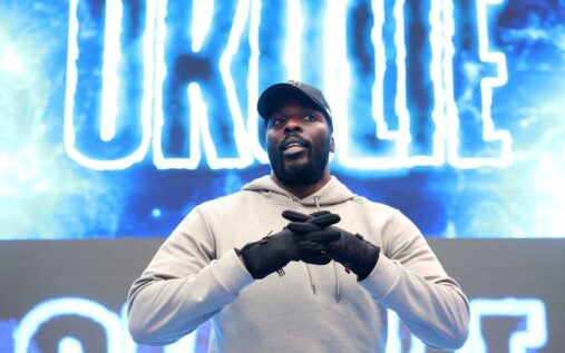Boxer Lawrence Okolie and promoter Frank Warren at a press conference