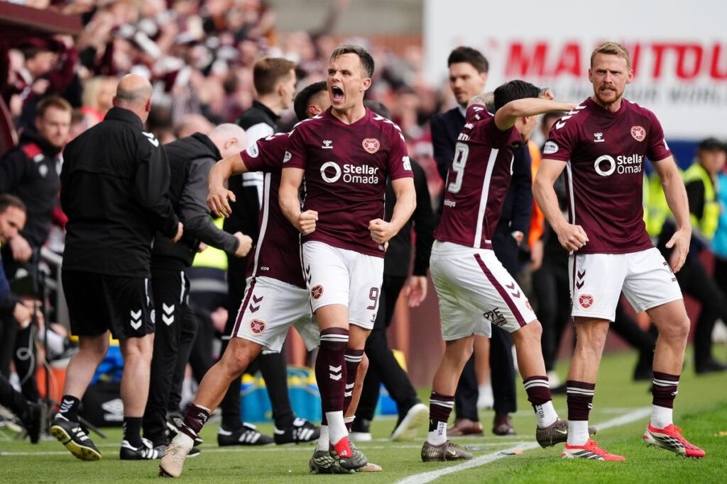 Lawrence Shankland celebrating his winning goal for Hearts against Rangers at Tynecastle