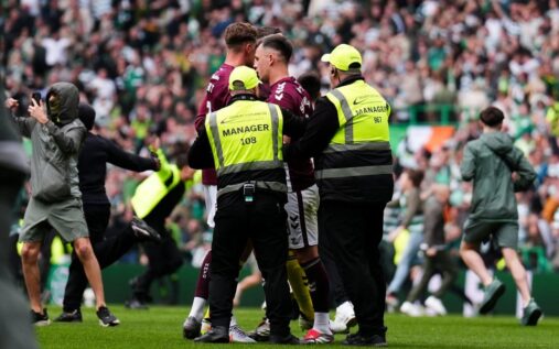 Celtic supporters invading the pitch at Celtic Park during the Scottish Premiership title decider against Hearts