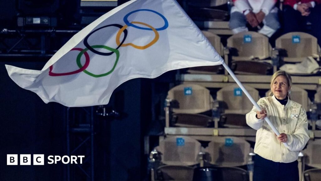 The Olympic rings logo displayed outside an international sporting venue