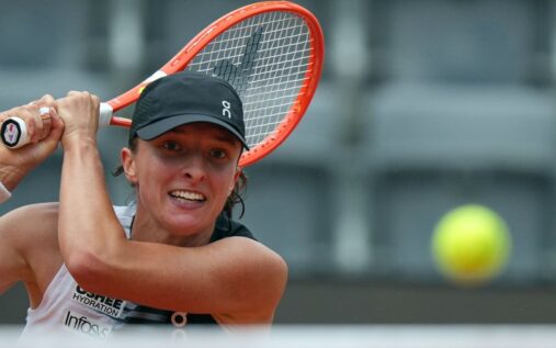 Iga Swiatek hitting a forehand during her three-set victory over Caty McNally at the Italian Open in Rome