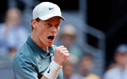 Jannik Sinner holds the Madrid Open trophy after defeating Alexander Zverev