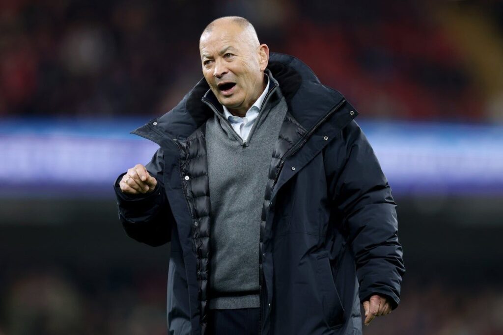 Eddie Jones looking serious while wearing Japan national rugby team apparel
