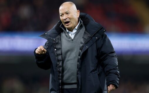 Eddie Jones looking serious while wearing Japan national rugby team apparel