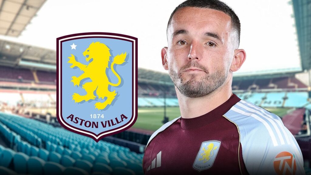 Aston Villa captain John McGinn applauding the supporters on the pitch at Villa Park.