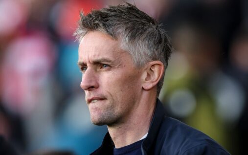 Ipswich Town manager Kieran McKenna applauding supporters on the touchline