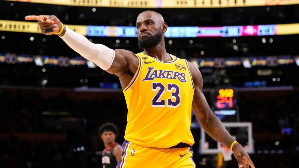 Los Angeles Lakers forward LeBron James looking reflective on the basketball court