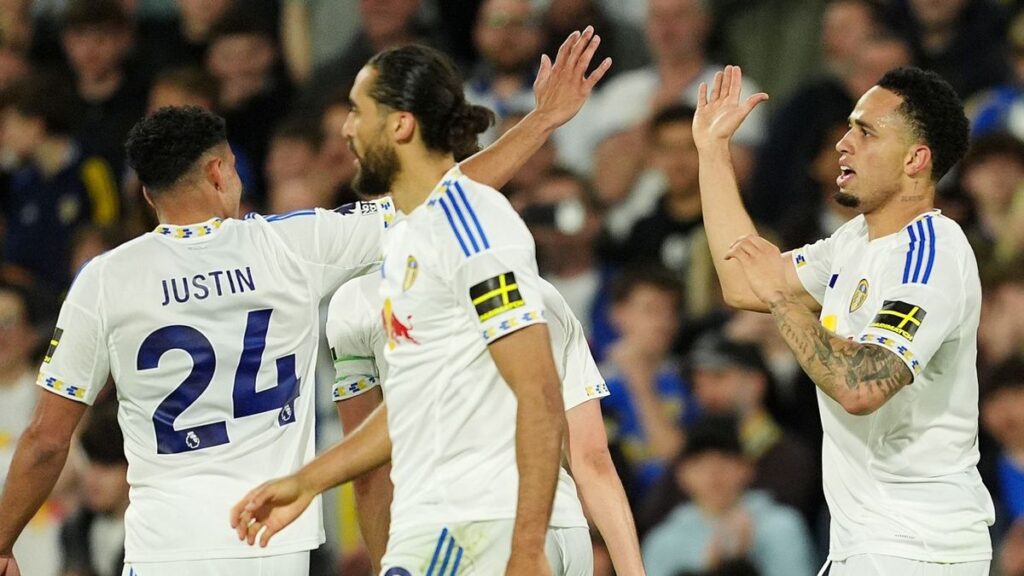 Leeds United players celebrating a goal against Burnley at Elland Road