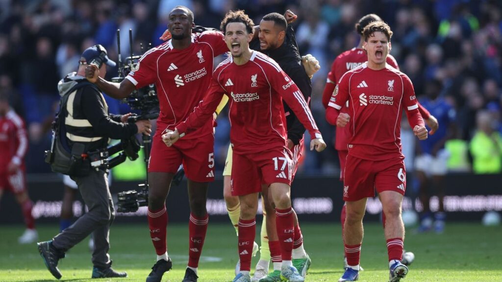 Mohamed Salah and Andy Robertson applauding the Liverpool fans at Anfield
