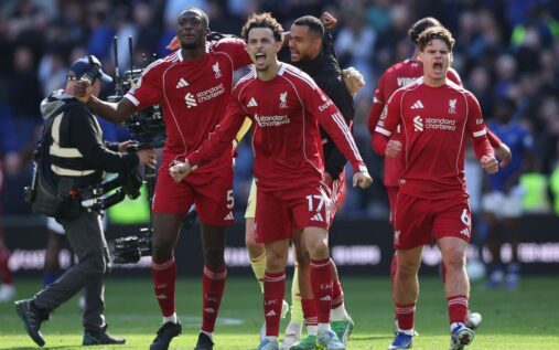 Mohamed Salah and Andy Robertson applauding the Liverpool fans at Anfield
