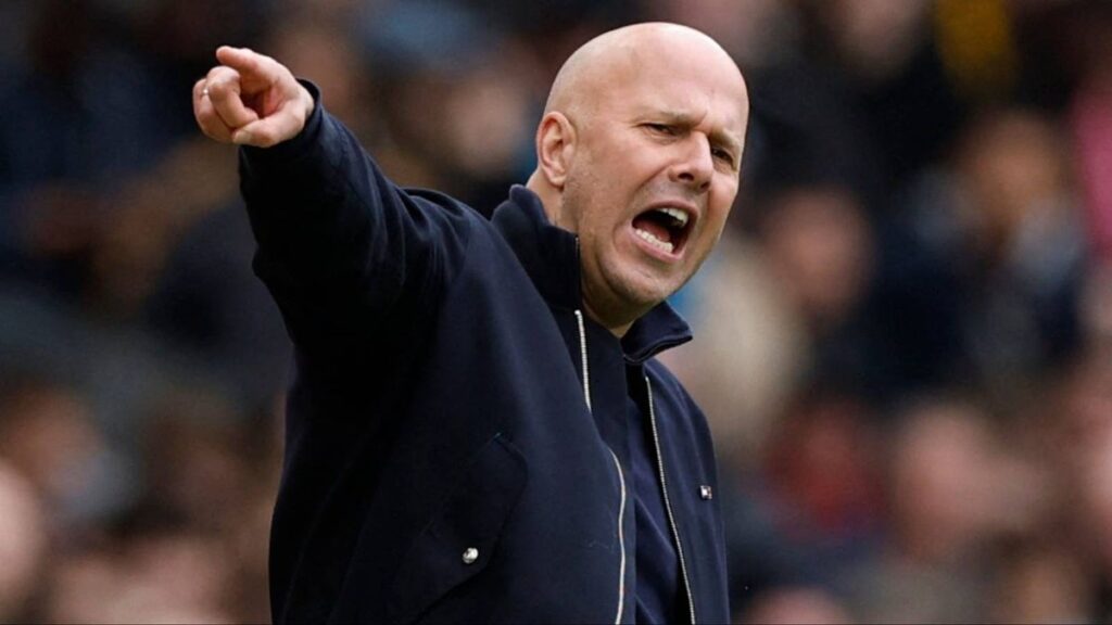 Liverpool manager Arne Slot standing on the touchline during a Premier League match