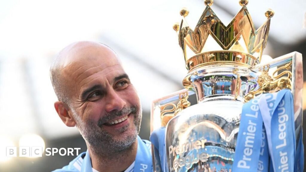 Manchester City manager Pep Guardiola standing on the touchline looking thoughtful during a Premier League match