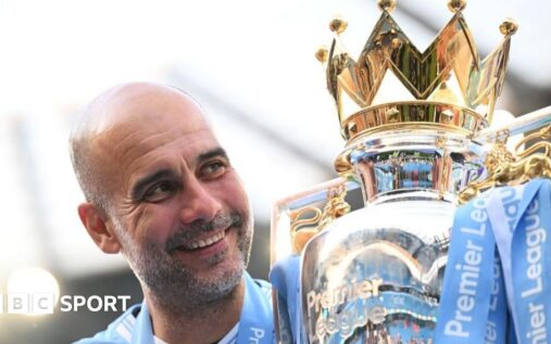 Manchester City manager Pep Guardiola standing on the touchline looking thoughtful during a Premier League match