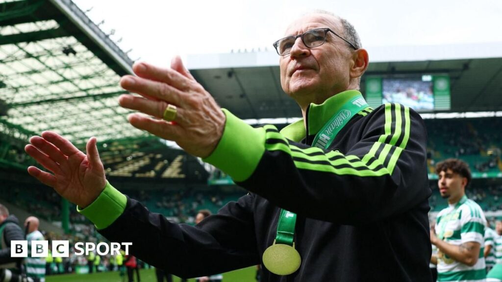 Celtic manager Martin O'Neill celebrating the Scottish Premiership title victory on the touchline