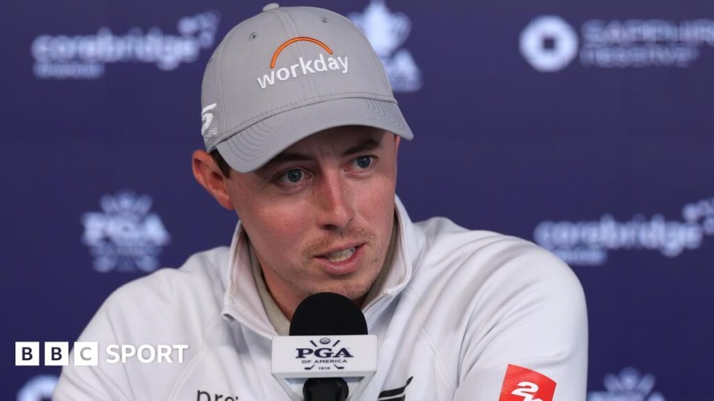 Matt Fitzpatrick lines up a putt on the green during a PGA Tour golf tournament