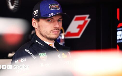 Max Verstappen looking frustrated in Red Bull racing gear at the Canadian Grand Prix